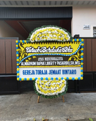 Papan Bunga Duka di Ayip